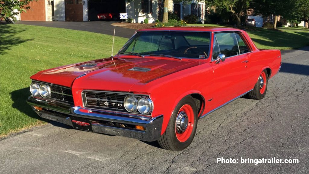 Photo of a red 1964 Pontiac GTO  American Muscle Car